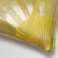 Detail of bright silk pillow made with vintage japanese obi silk with fan pattern.