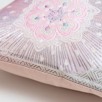 Detail of silver line on vintage pink obi pillow.