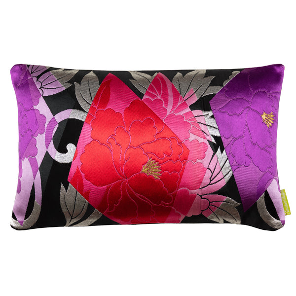 Pink and black silk accent pillow by Hunted and Stuffed, London.