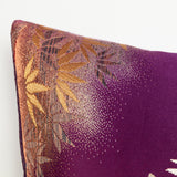 Purple silk bolster with gold bamboo detail