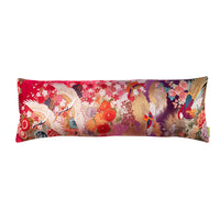 Red kimono bolster with gold accents
